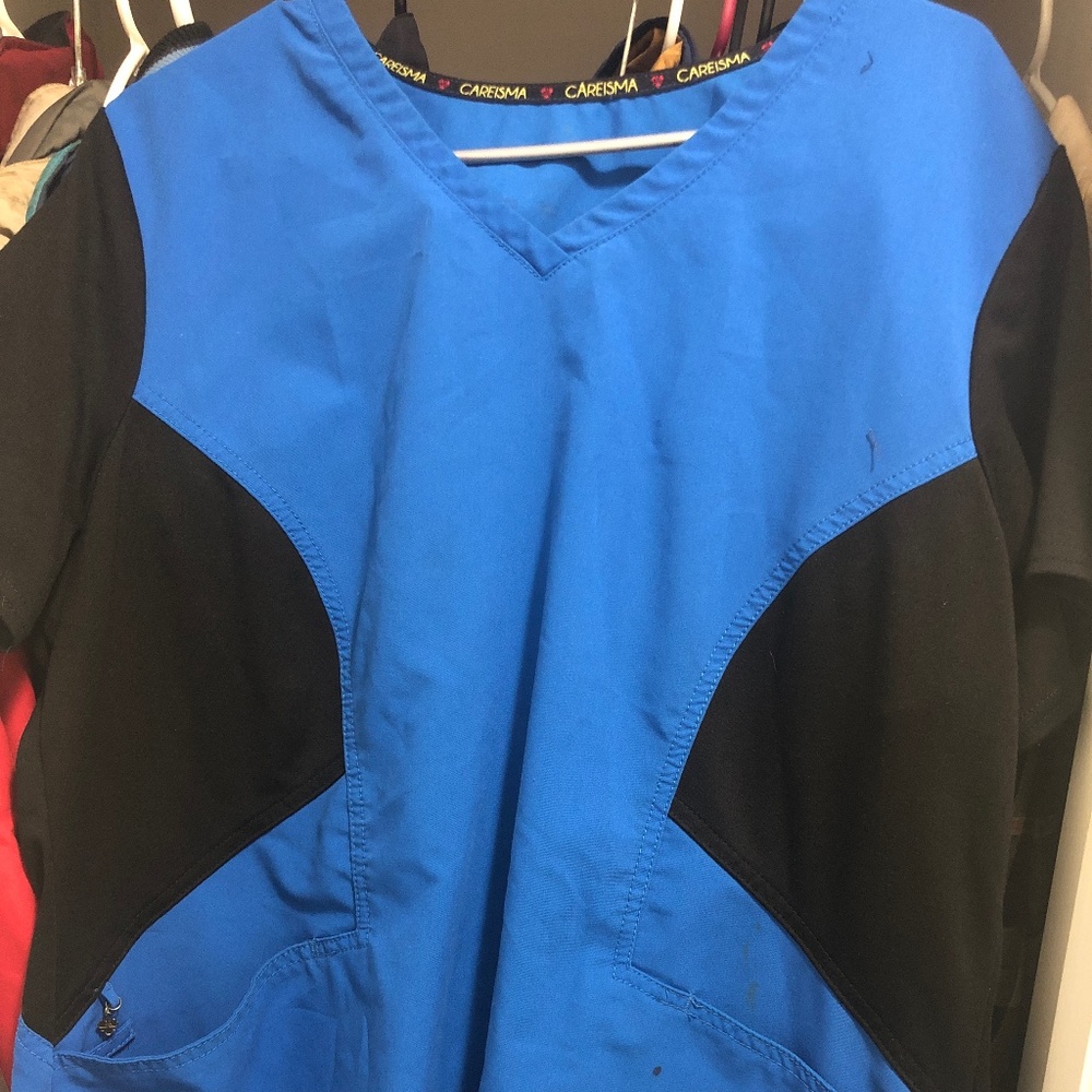 Care is a Women’s XL scrub top